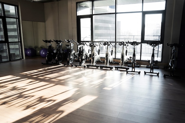gym-with-indoor-cycling-equipment_23-2149270209